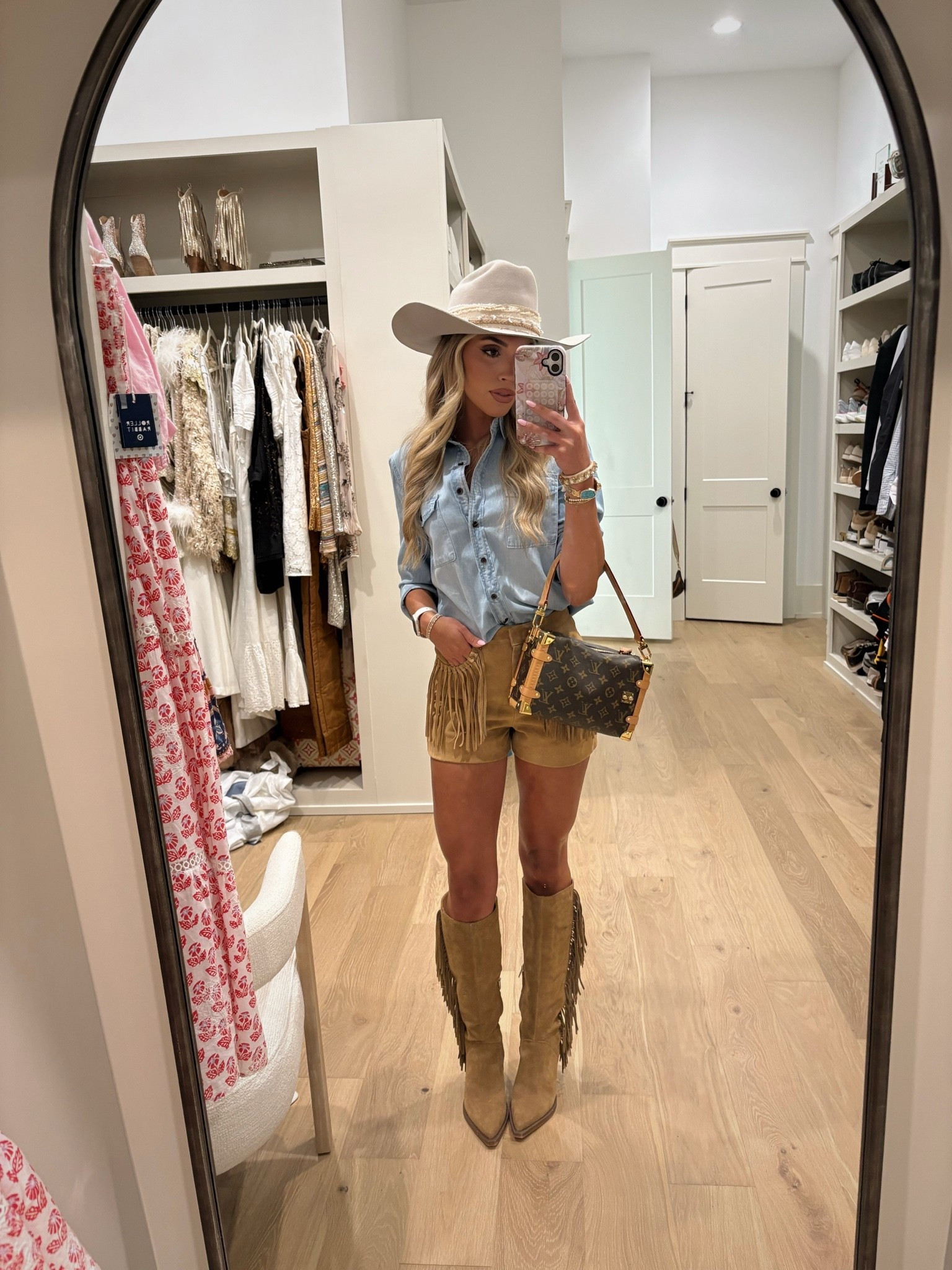 Kicking off CMA fest ✨🤎 suede fringe shorts, chambray button up, turquoise accessories + fringe boots! my shorts i got awhile ago and are sold out but linking similar! 

Country concert outfit
Summer outfit
Western outfit 
Fringe boots
Fringe suede shorts

#LTKgrwm #LTKootd #LTKSeasonal