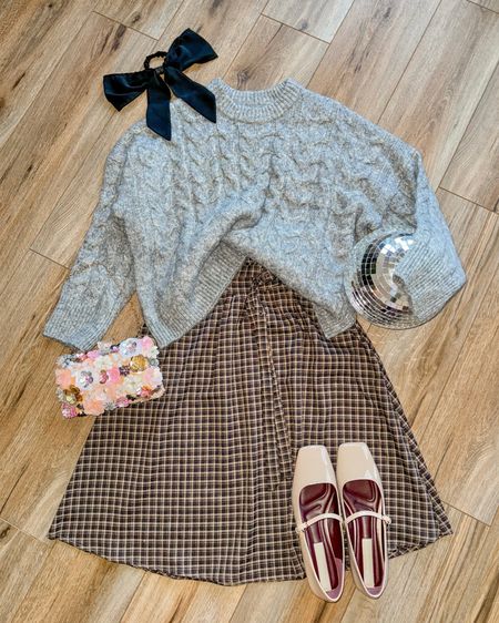 Folklore era outfit. Plaid skirt. Knit sweater. Cream Mary Jane flats. Holiday outfit. Christmas outfit. 

#LTKHoliday #LTKSeasonal #LTKGiftGuide