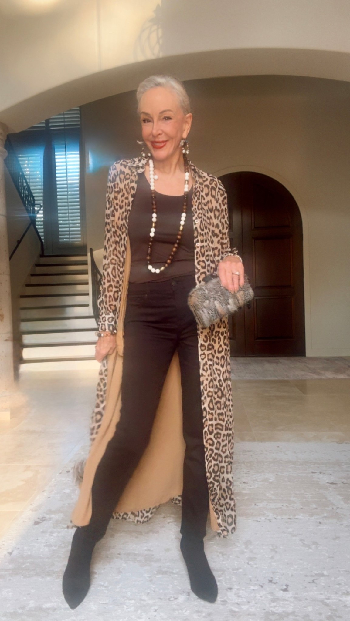 Chico’s Georgette leopard
Maxi dress worn as a duster over brown Girlfriend slim jeans with brown booties. 
40% off highest priced item and 25% on the rest 
Feather clutch
Over 40

#LTKFindsUnder50 #LTKSaleAlert #LTKFindsUnder100