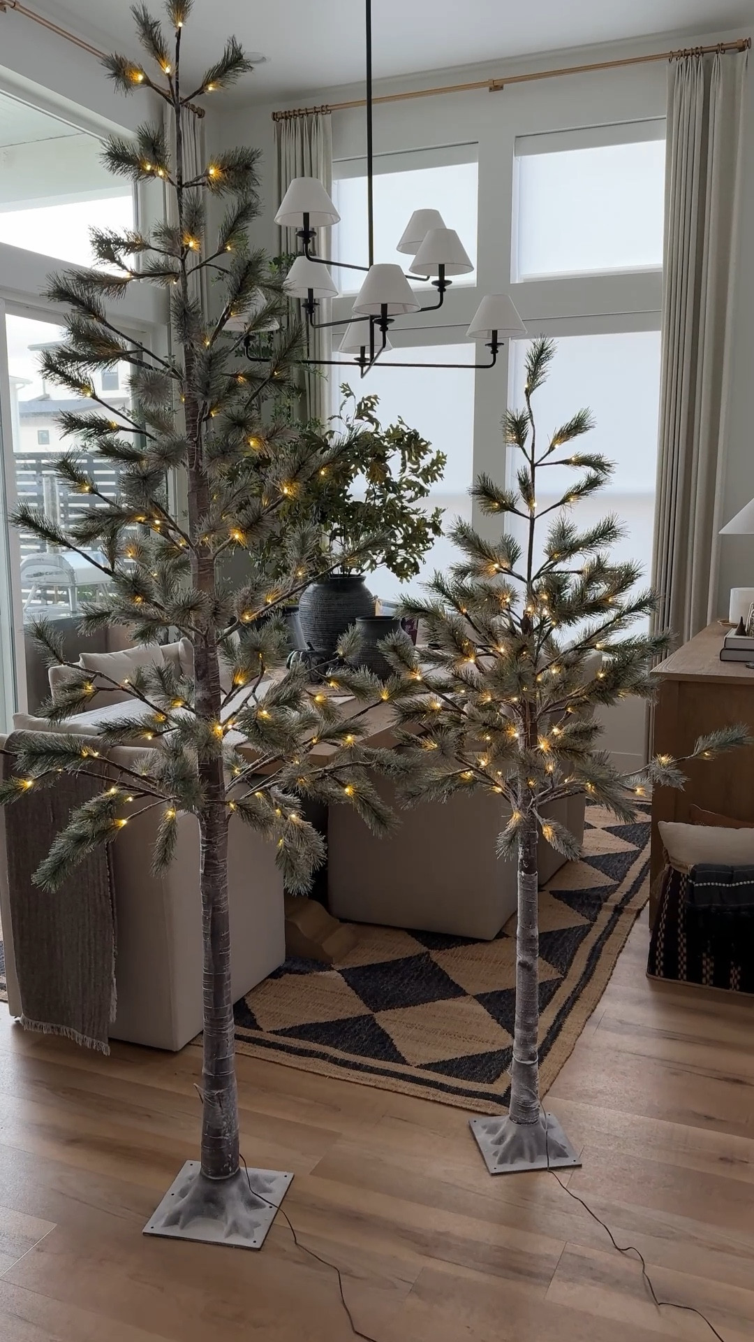 Outdoor light up faux Christmas trees. Comes in 2 sizes, 6’ and 8’ they have a little bit of flocking on them too! 

#LTKVideo #LTKHome #LTKHoliday