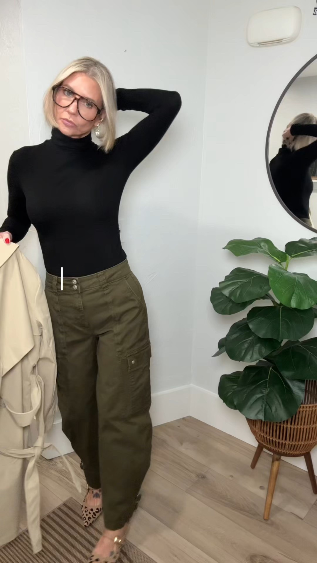 This turtleneck bodysuit is so soft and stretchy! I’m wearing a medium and it comes in several other colors. Also full confession I don’t clip it, I just tuck it 🤭

My pants are older from Walmart BUT I found a super similar pair at Loft and they’re current on sale! 

#LTKootd #LTKgrwm #LTKOver40