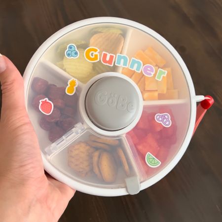 Mom must-have! The snack spinner for kids is perfect to send to school, bring when traveling, or just make eating fun for picky eaters! 

#LTKbaby #LTKfamily #LTKtravel