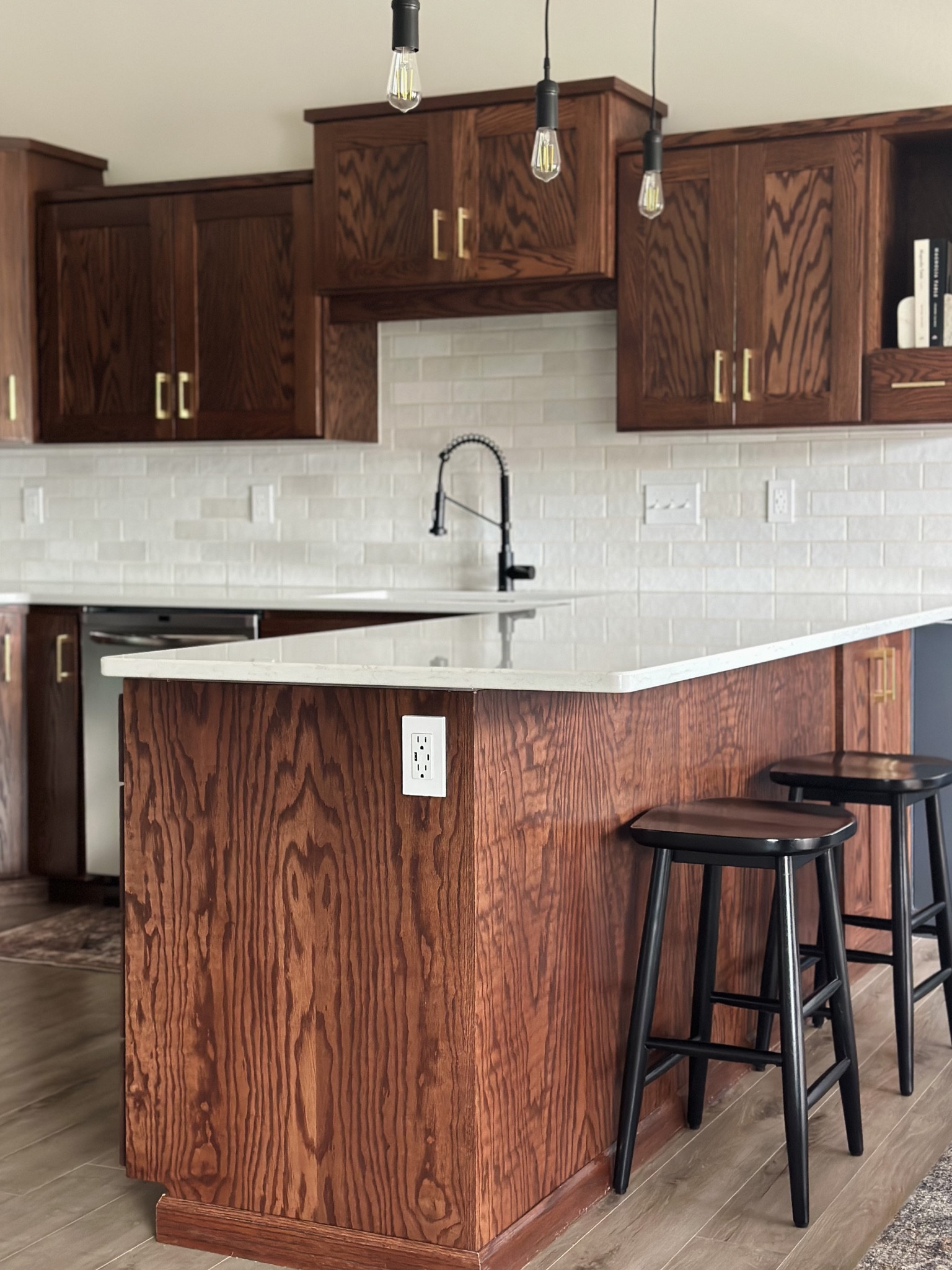 Kitchen renovation reveal!

Use code HAMANNS for 10% off your tile order!

Walnut kitchen cabinets, kitchen inspo, Alexander James ceramic white handcraft tile, white kitchen backsplash, Zellige tile, kraus matte black kitchen faucet, white quartz countertops, vicostone Aspen, studio McGee barstools, black barstools, brass hardware, brass cabinet pulls, kitchen cookbooks, outlet covers 

#LTKstyletip #LTKFind #LTKhome