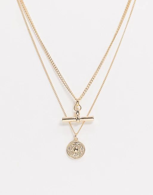 ASOS DESIGN pack of 2 necklaces with t bar and coin pendant in gold tone | ASOS US