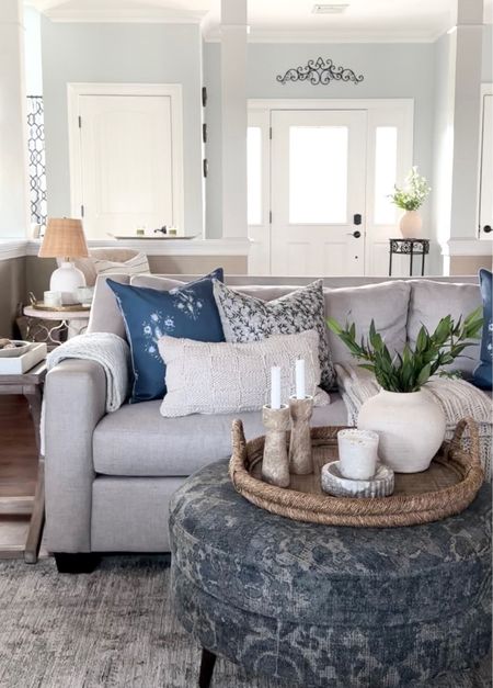 Living room styling. Sofa, area rug, cozy and comfy throw pillows and blankets,  coastal tray, vase, marble candleholders, candle. Target, Amazon home, Anthropologie, Ballard Designs. Free shipping. 

#LTKsalealert #LTKfindsunder50 #LTKhome