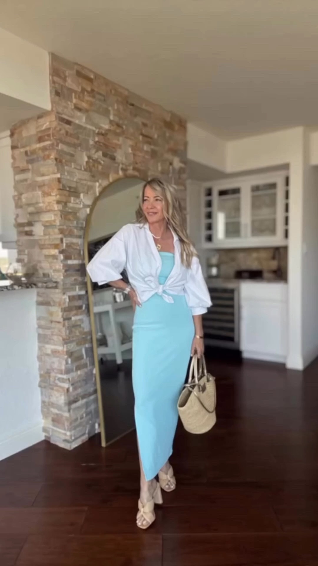 Wearing one of my most worn Amazon pieces—a strapless bodycon dress I have in several colors 🤍 I tied a white blouse over it to add a little coverage and shape, and it completely elevates the look. Easy, flattering, and one of those outfits I reach for again and again.

#LTKOver40 #LTKTravel #LTKootd
