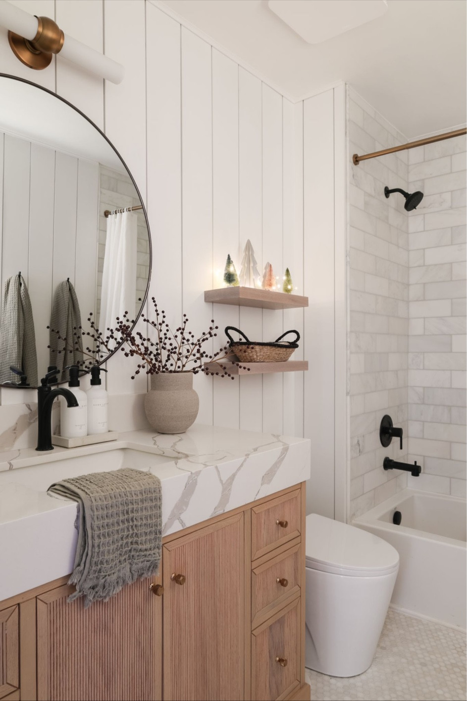 Vanity: Manhattan Oak 48” with a 5” Calacatta Laza countertop from Willow Bath & Vanity. Code: Christina10 for 10% off

Shiplap: Nickelgap 8 inch from Weaber Lumber

Tile: Marble subway tile, marble penny tile from Riad Tile

Bathroom accessories, bathroom decor, bathroom renovation 

#LTKFindsUnder100 #LTKHoliday #LTKHome