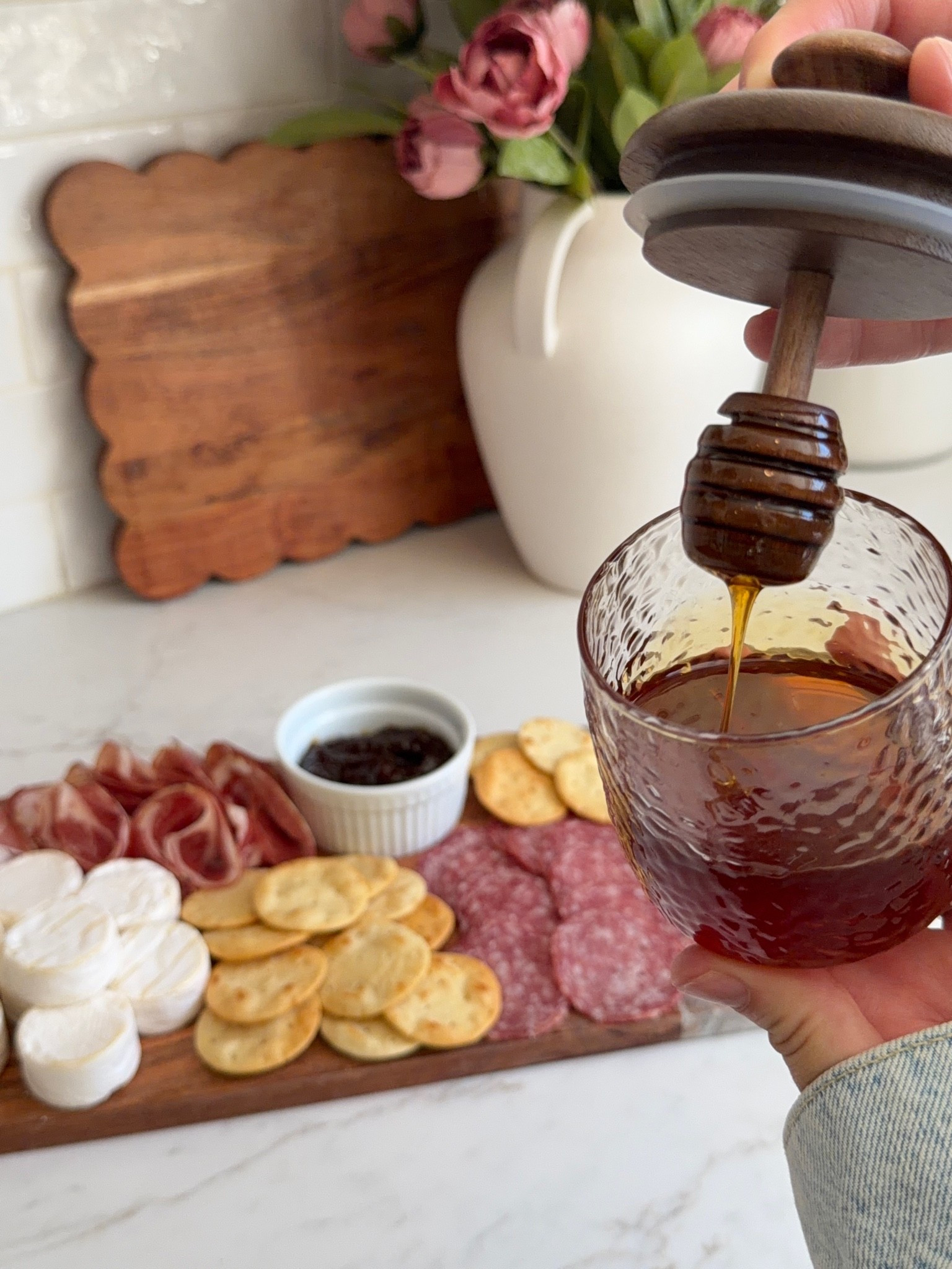 A summer hosting idea you’ll want to save 🤍

We made a savory s’more with brie, salami, fig jam, and hot honey and trust us, the hot honey is the real star. 🍯✨

Everything shown here is linked in our LTK!