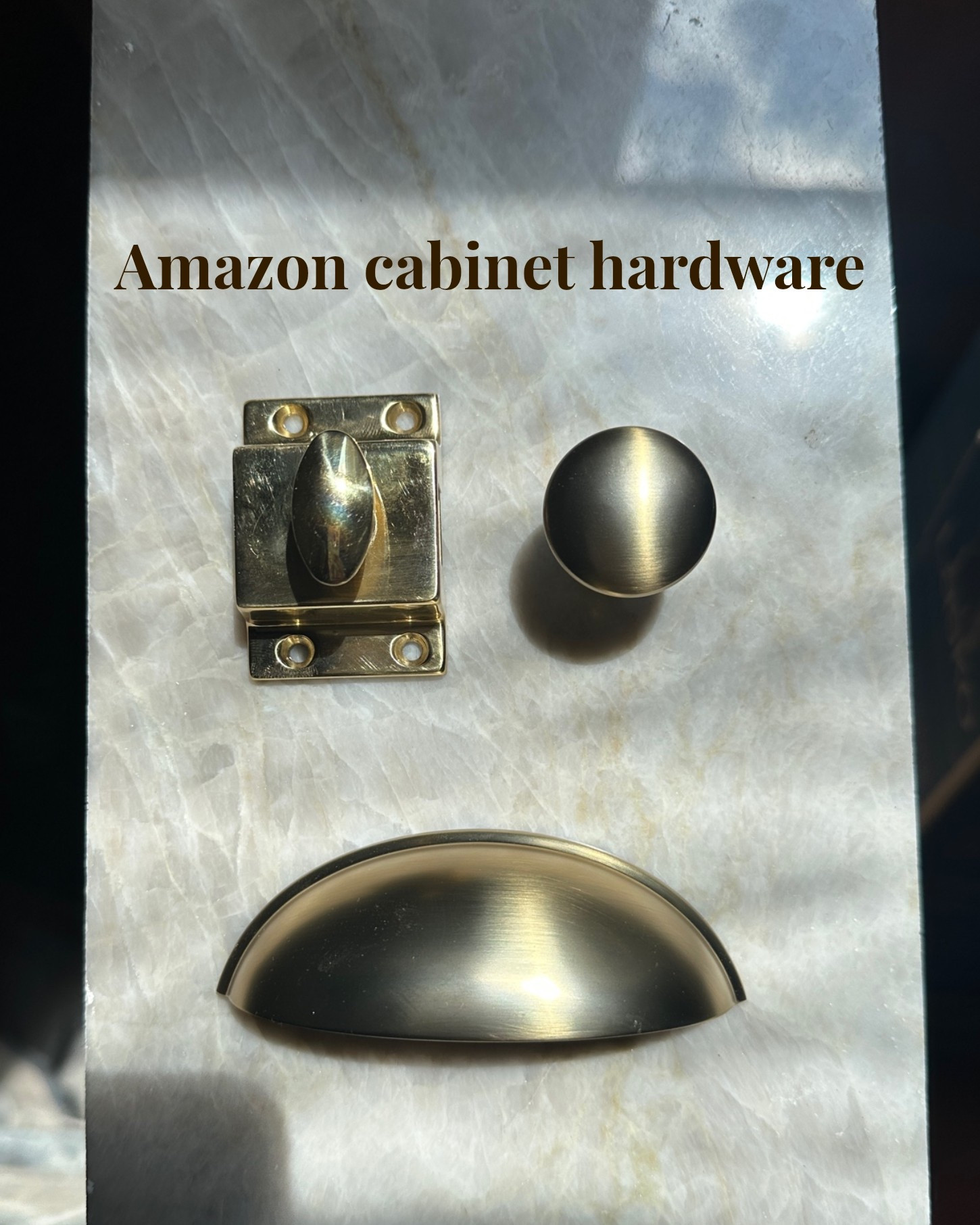 Amazon cabinet hardware
The latch is solid brass, and the cup pull and knob is champagne bronze. It was a tad warmer than the brushed gold option

#LTKHome