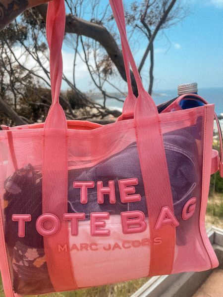I cannot rave enough about the Marc Jacobs Mesh Tote! This bag is PERF for traveling and going to the beach. It is sturdy, and easy to clean. 

The tote comes in a variety of sizes and colors, including this pink one which you can find linked here!

#LTKitbag #LTKtravel #LTKSeasonal