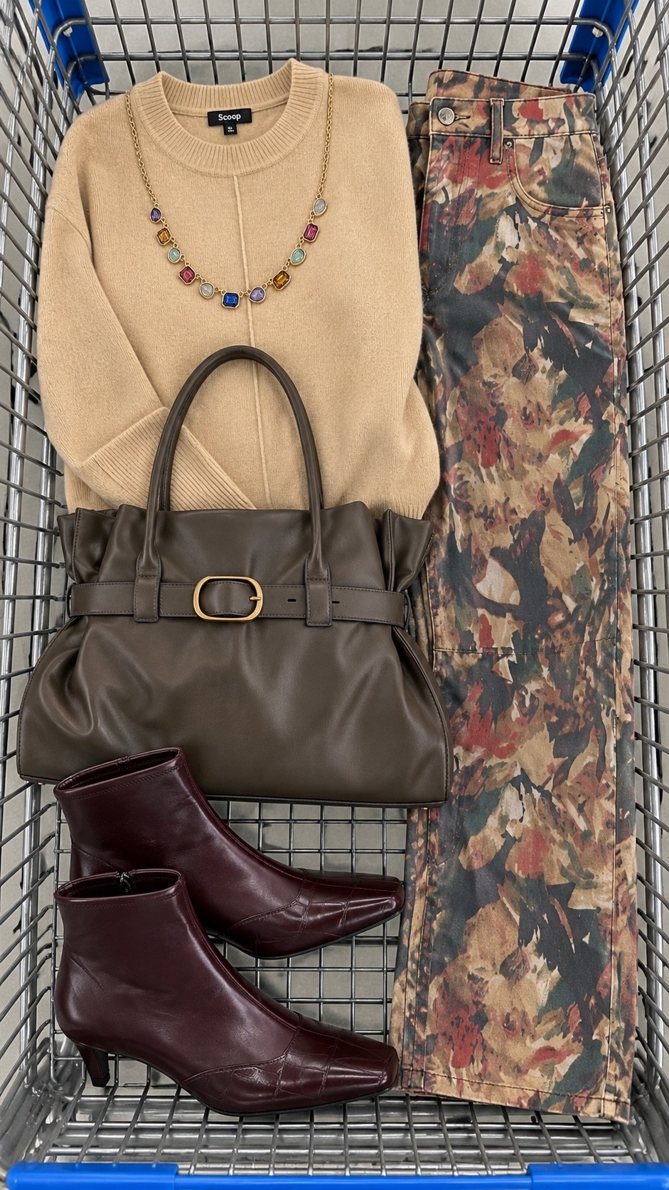 This neutral sweater + printed denim combo feels so fresh for fall. The burgundy boots and statement necklace pull out the colors in the jeans perfectly, and that oversized brown bag makes the whole look feel way more expensive. 🍂

#LTKNYFW #LTKgrwm #LTKootd