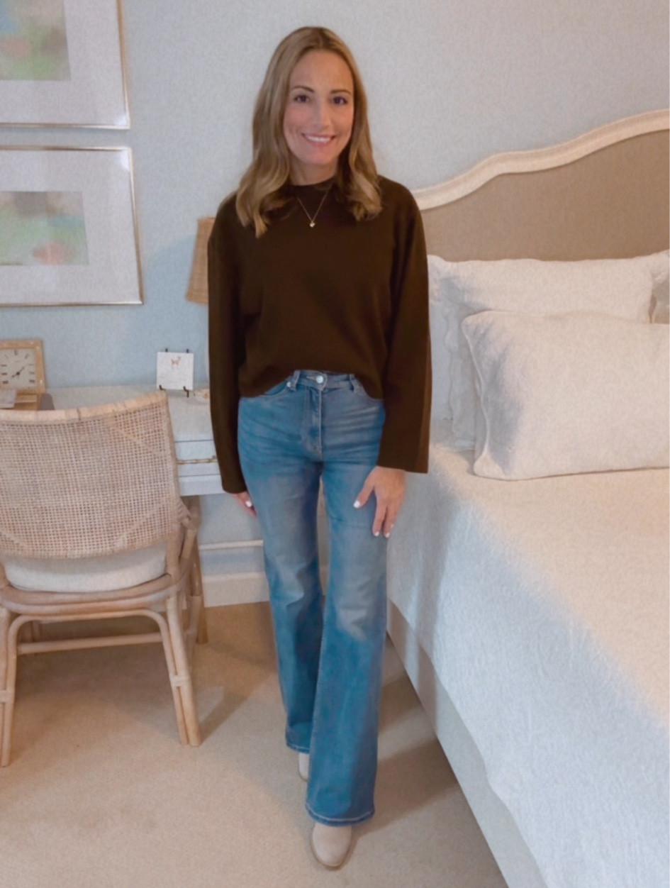 Women’s brown lightweight sweater. Women’s flares high rise jeans. Camel color boots. Block heel boots. Heart gold necklace. Dainty earrings. 

#LTKFindsUnder50 #LTKFindsUnder100 #LTKStyleTip