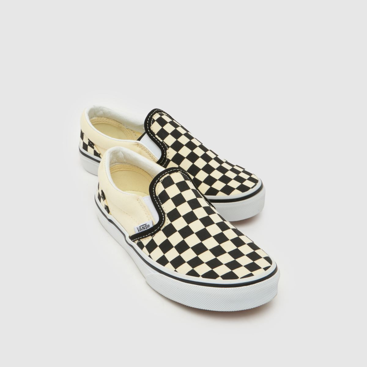 Kids Junior Black & Cream Vans Classic Slip-On Trainers | schuh | Schuh
