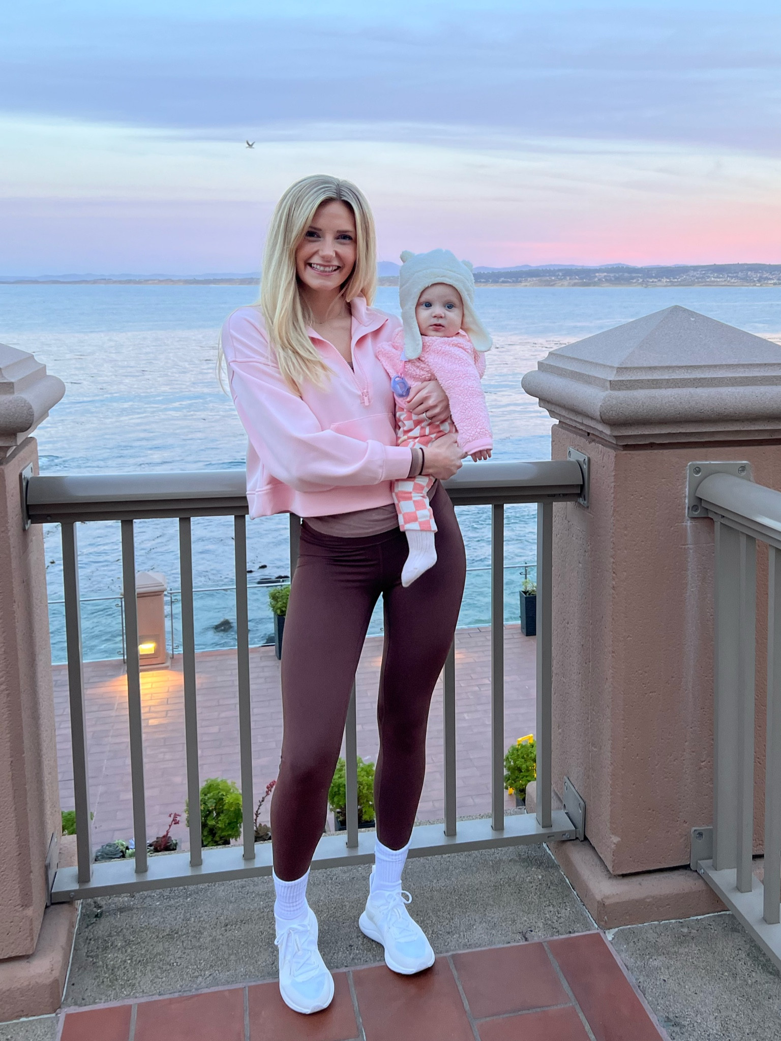 Cute traveling outfit for the airport and airplane. Very comfortable and layered options for when you get hot or cold! Im wearing the coffee brown CRZ leggings. Also baby girls checkered onesie was so cute! 

#LTKbaby #LTKtravel #LTKfindsunder50