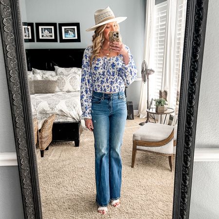 The cutest spring outfit. Everything runs tts. 
Jeans | flare jeans | cropped top | date night outfit | spring outfit | hat | sandals | heels | vacation outfit | hat | straw hat | blouse | Easter | casual outfit 

#LTKfindsunder50 #LTKsalealert #LTKstyletip
