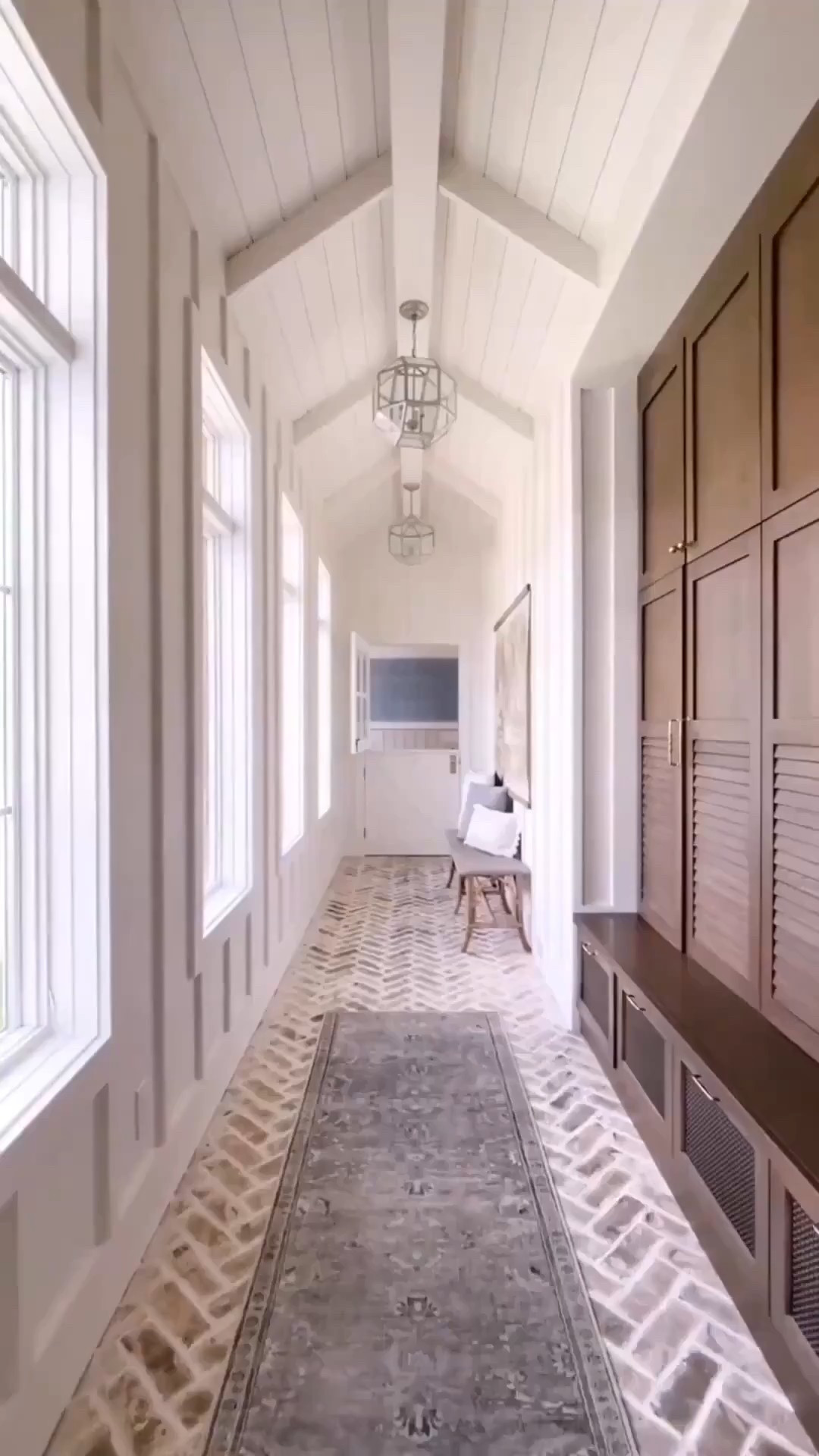 Breezeway hallway - Serena and lily bench - Anthro tapestry - hallway pendants lighting #LTKVideo 

#LTKHome #LTKStyleTip