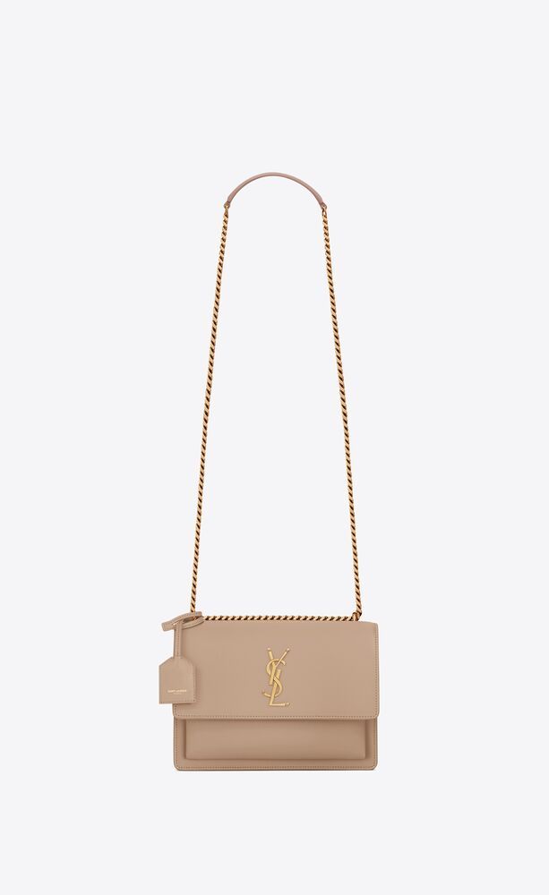 Saint Laurent monogram bag with front flap, featuring side gussets, chain and leather shoulder st... | Saint Laurent Inc. (Global)