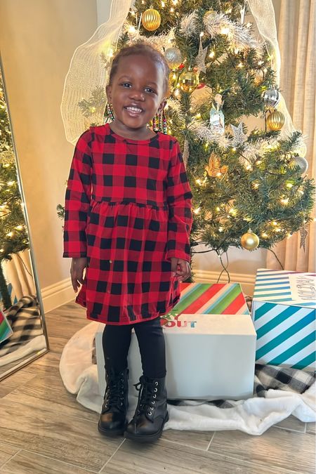 Christmas outfit for toddler girl. Red and black plaid dress, black leggings and black combat boots  

#LTKHoliday #LTKfamily #LTKkids