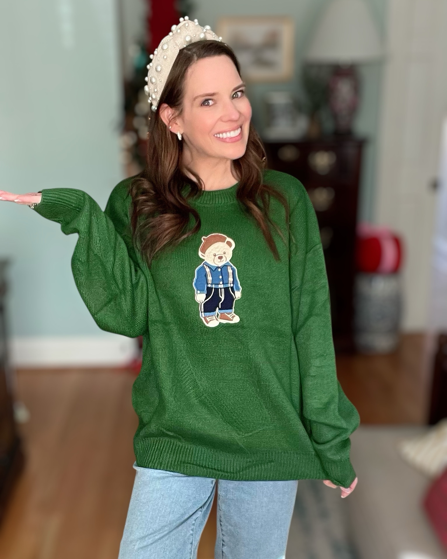 Green Teddy Bear Sweater & Cuffed Denim 🤍🐻

This cozy green teddy bear sweater is such a fun, playful winter piece while still feeling easy and wearable 🤍 The oversized fit makes it perfect for everyday styling, and the bear graphic adds just the right amount of charm without feeling juvenile. I paired it with cuffed light-wash denim for a relaxed, casual look that still feels put together.

Neutral flats keep this outfit comfortable for all-day wear, and the pearl headband adds a polished, feminine touch that balances the casual sweater perfectly. This is one of those outfits that works great for errands, casual days, school drop-off, coffee runs, or cozy weekends at home — comfortable, cute, and effortless all at once ✨

Green sweater outfit, teddy bear sweater, casual winter outfit, oversized sweater look, cuffed jeans outfit, everyday casual style, cozy sweater weather outfit, affordable Amazon sweater, relaxed denim outfit, cute casual winter look

#LTKGiftGuide #LTKFindsUnder50 #LTKHoliday