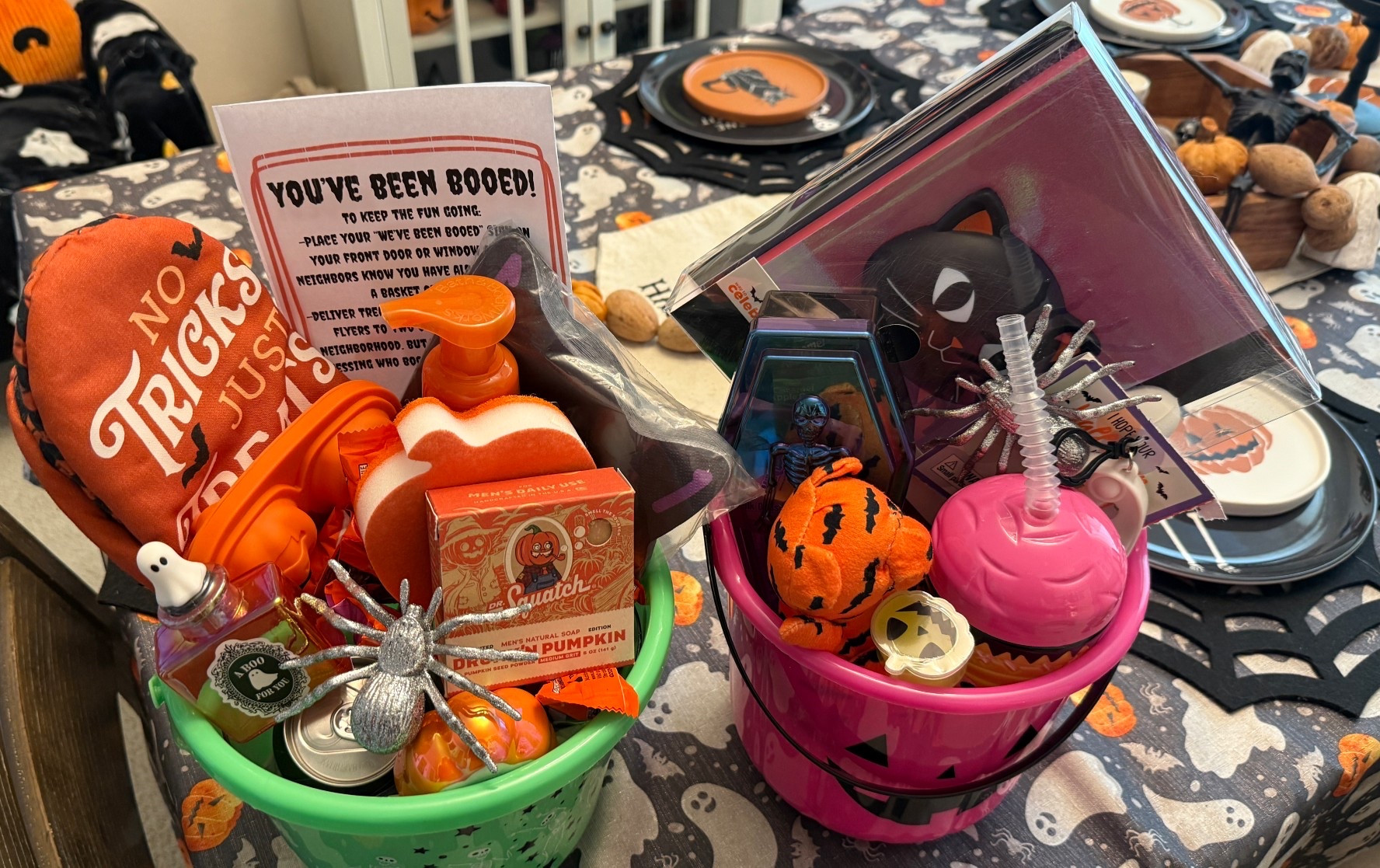 Impromptu boo baskets I made for my neighbor who hadn’t been hit yet! The green bucket was for her and her husband and the pink for their daughter 

#LTKHalloween #LTKSeasonal #LTKHoliday