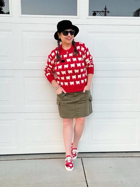 Princess Diana cotton sheep #sweater paired with an olive cargo #skirt~ pulled together, easy style, lots of pockets! The #Sperry collab with Warm & Wonderful offers unisex sizing in these cute ‘black sheep’ #sneakers 🖤🐑❣️#jumper #sheep #winter #buckethat #holidayoutfit #red #trainers #warmandwonderful #falllook 

#LTKshoecrush #LTKSeasonal #LTKsalealert