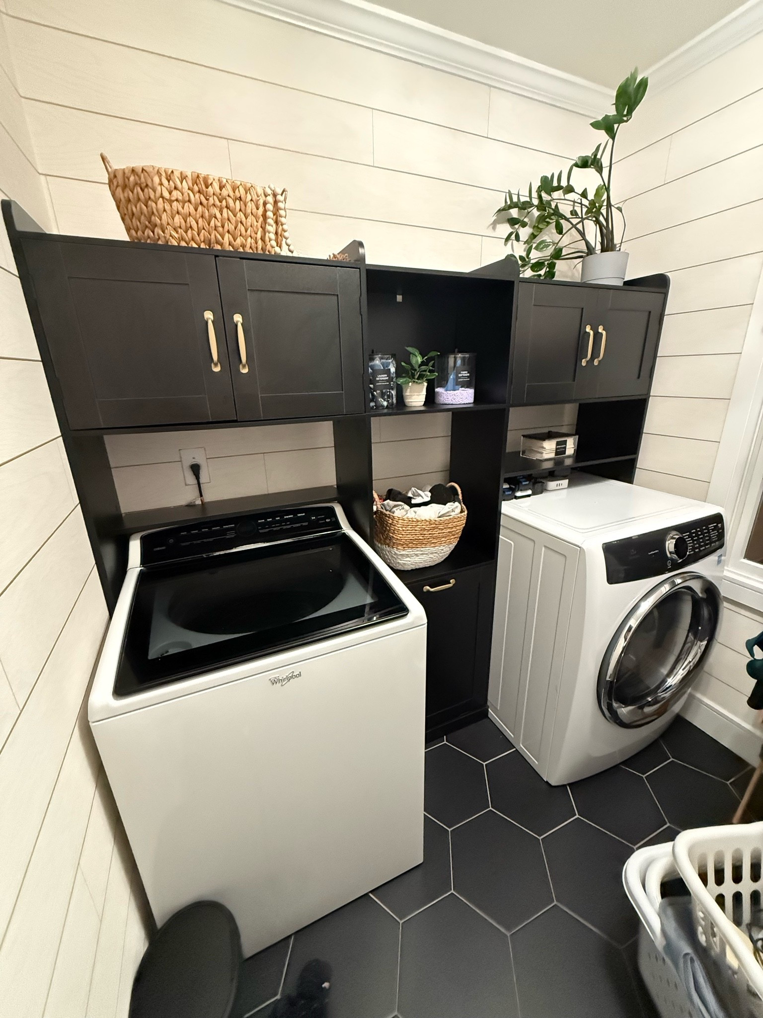 Temporary but useful inexpensive over the washing machine and dryer system! Easy to build and use! Even has a center laundry pull out bin! I spray painted the handles gold to have them match other finishes in my house!  #laundryroom

#LTKHome