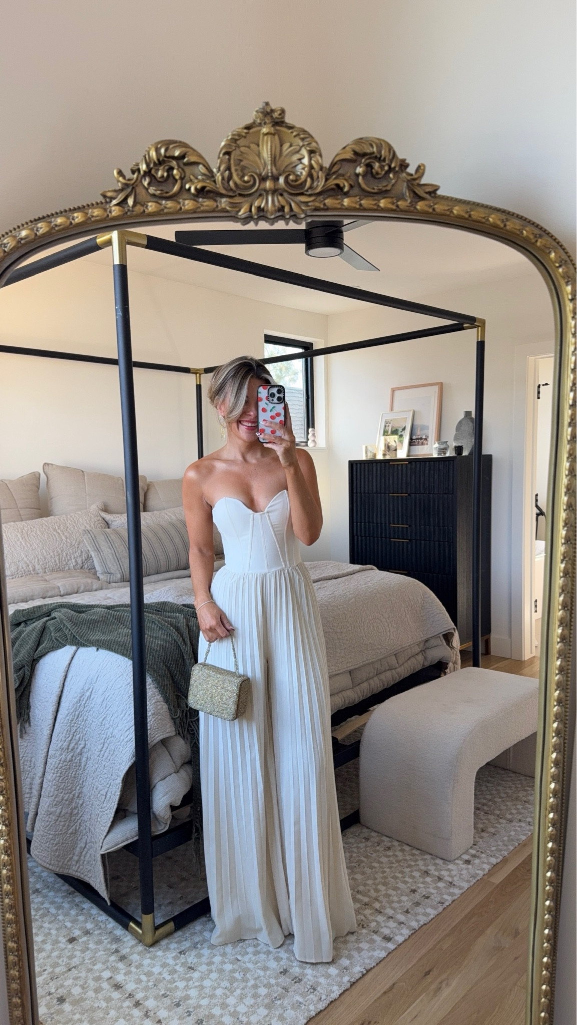 White strapless pleated jumpsuit wedding guest look holiday formal event dress. Wide leg white pleated jumpsuit  

Wearing my usual size 2  

#LTKParties #LTKWedding #LTKHoliday