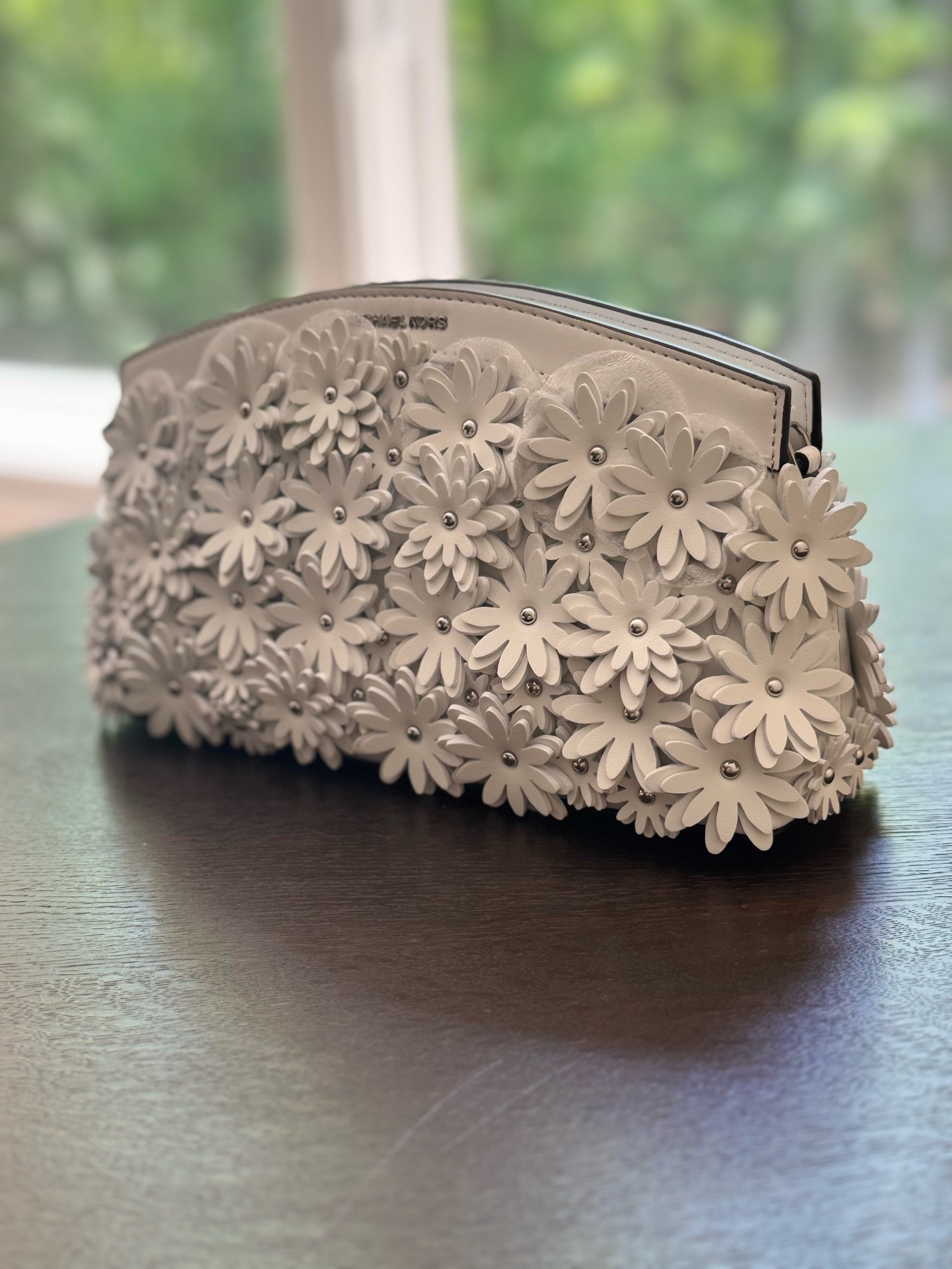 This sweet purse just went on sale!! 30% off and just in time for summer… includes a crossbody strap or just use it as a clutch!

#LTKOver40 #LTKSaleAlert