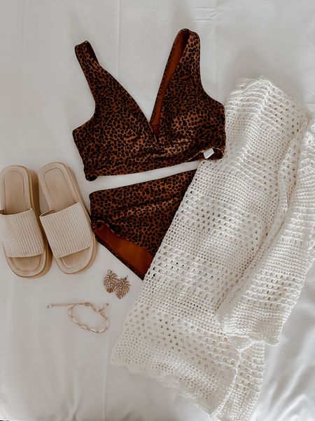 POOL DAY VACAY OOTD 🐚🐆🌊🌿🥥 old navy swim suit super cute two piece set top runs a little large but also is very low cut! Bottoms also right slightly large as well. Swim cover up super cute crochet knitted style. Super comfy platform sandals to walk in. Cute coastal cowgirl beachy vacation accessories 

#LTKtravel #LTKSeasonal #LTKswim