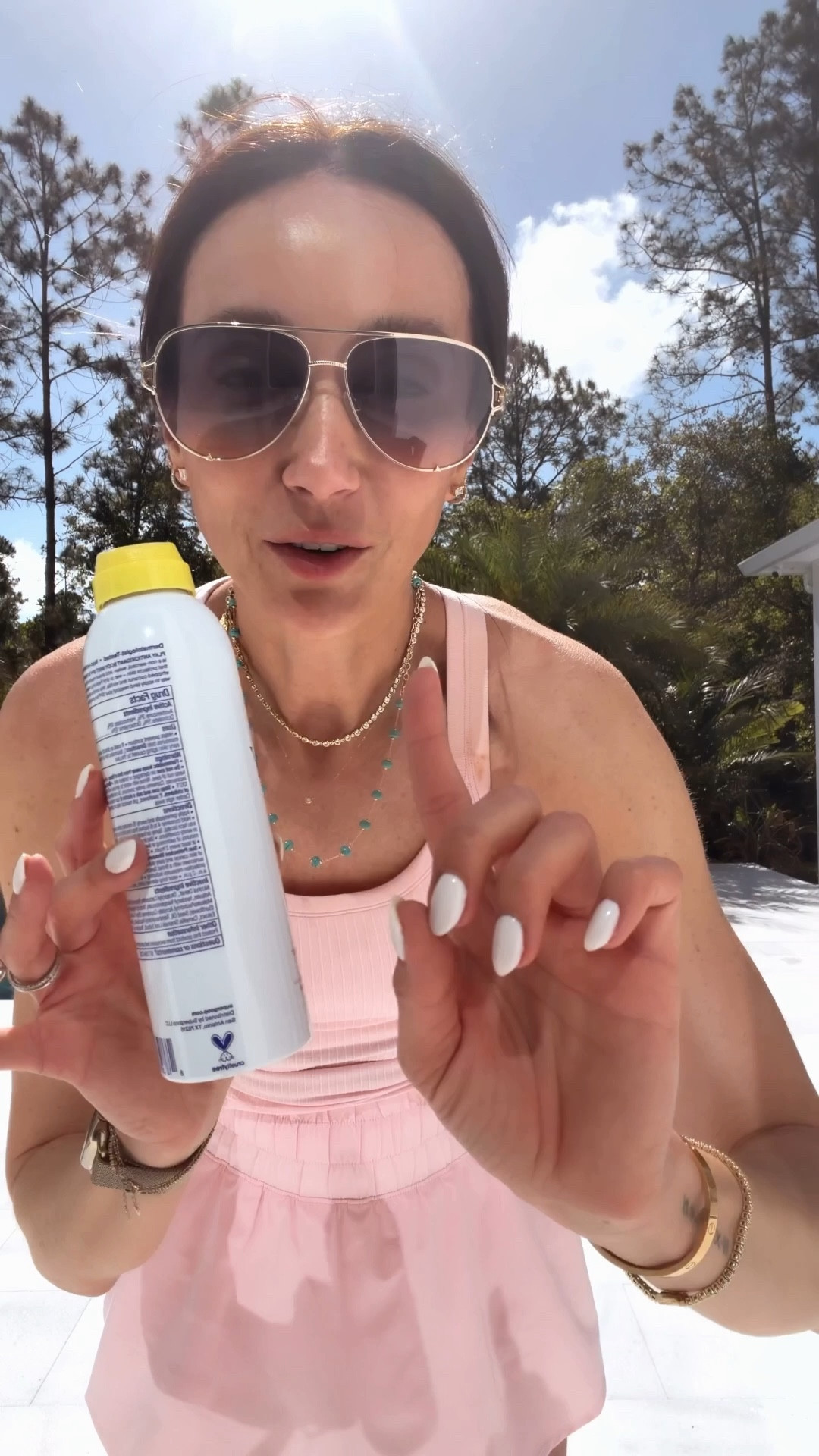 Favorite body sunscreen and it smells incredible 🥥 🌴 wearing s in Amazon tank and shorts 

#LTKootd #LTKOver40 #LTKActive