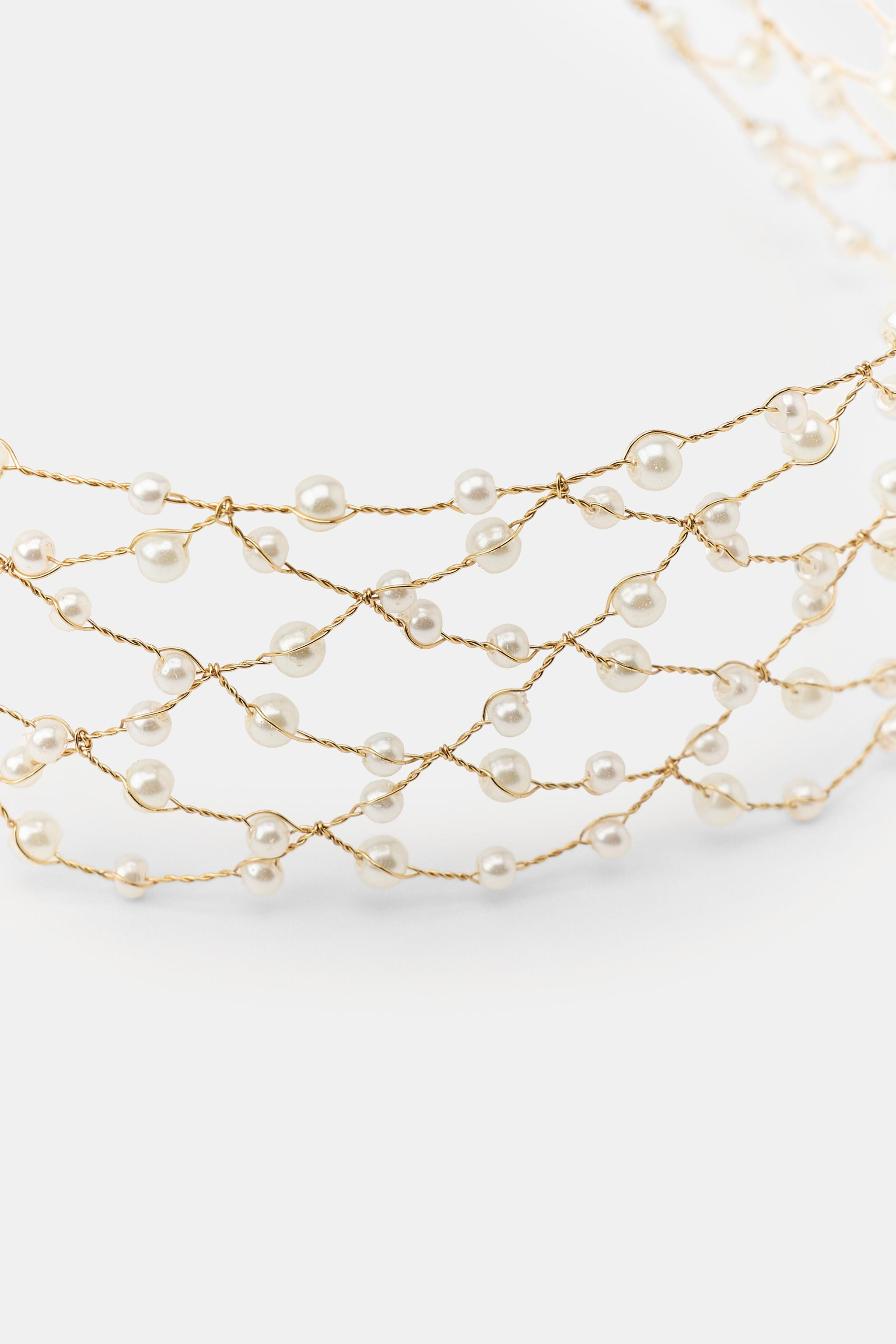 Multi-strand metallic choker necklace featuring mini pearl appliqu\u00e9s. Lobster clasp closure. | Zara US