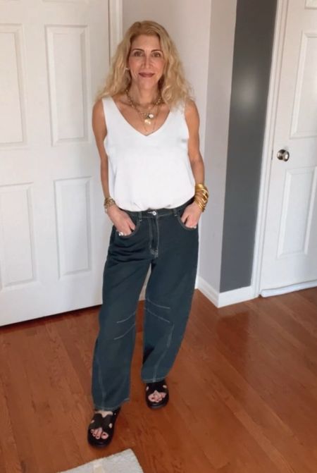 Yea I had to get another pair of barrel jeans! And this pair is under $50! They run true to size. I’m wearing a size medium (6). My tank and slides are also under $50.

#LTKover40 #LTKfindsunder50 #LTKstyletip