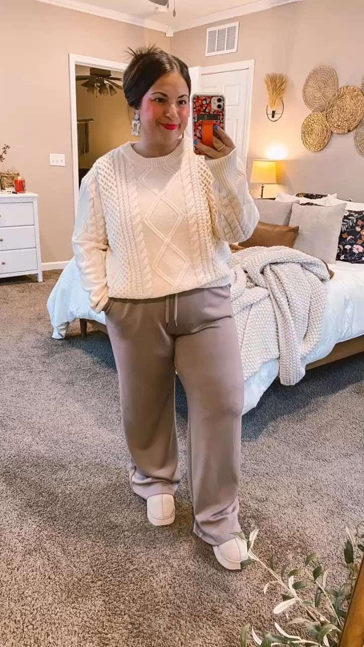 This jumpsuit from Walmart is so versatile and chic! So easy to dress up or down & it's super comfortable!💖 It proves that style doesn’t have to break the bank. 

slippers: fit true to size // wearing a 5
jumpsuit: fits true to size, a tad long // wearing a large
sweater: fits true to size // wearing a large
use code SMALLTOWN10 for a discount on earrings: https://spiffyandsplendid.com/collections/dangle-earrings/products/margot-earrings-sandstone 

 #LTKWatchNow #LTKStyleTip #LTKWorkwear