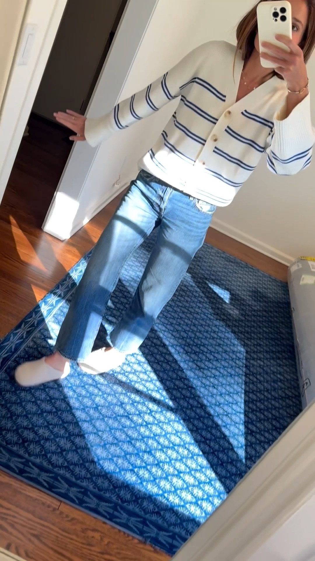 Had to share another angle of this OOTD with the beautiful natural light. Notice how I buttoned the Lake Nora cardi this time. It looks so chic. 

Also slipped off my flats and pivoted to my super warm and comfy clogs since I’ll be home the rest of the day. These clogs are Rothy’s and are on sale for 20% off which almost never happens!!

Sizing notes: 

Cardigan: Sized down to an XS. Vneck: Wearing a small. Jeans: Run tts, in a 25. Use MEG for a little $$ off. Flats run tts, in a 37. Also including a very similar pair (that I own and have worn on repeat for 2 years) if you're not looking to invest in the style. xx Meg 

#LTKSaleAlert #LTKStyleTip #LTKFindsUnder50