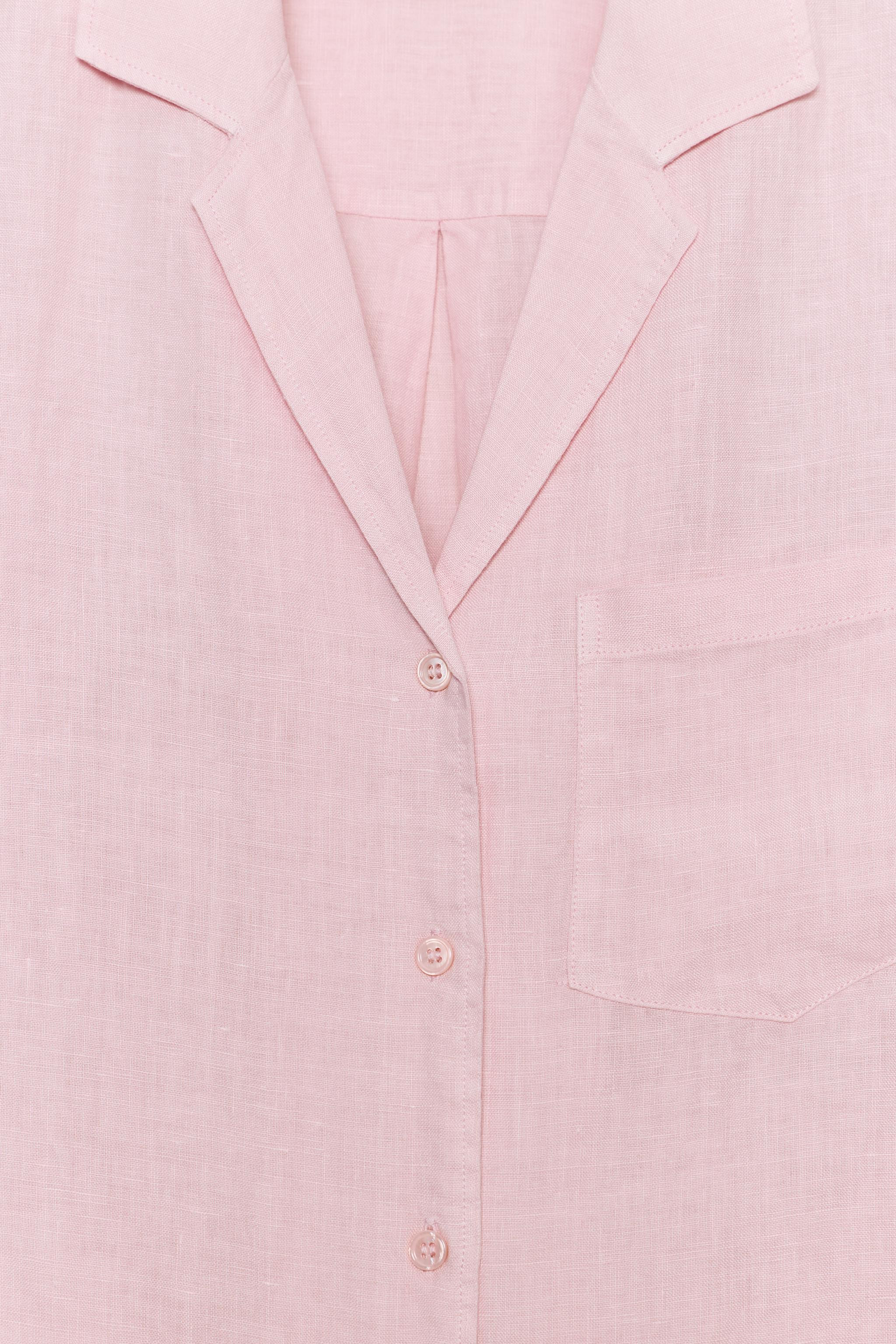 ZARA WOMAN COLLECTIONShirt with main fabric made of 100% linen yarn. Lapel collar and long sleeve... | Zara US