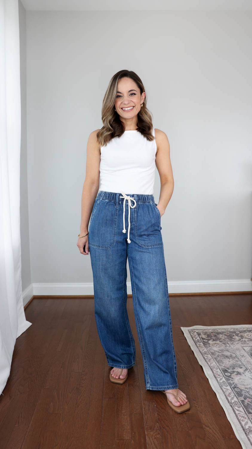 Three Petite-friendly pairs of drawstring jeans for spring and summer! 

J.Crew Factory Petite Light-Feel Drawstring Jeans: Petite 24 | 10" rise | 28" inseam | true to size

This pair seems to have sold out in petite. However, of the three I tried these ran the largest and longest (but snug on my hips). So they’re not the best of the three. 

Tank Top (Quince): XS 

Sandals (Tkees): True to size

My sizing for reference: I'm 4'10" and weigh 105lbs. My measurements are 32", 24", 36". I have a 25" ankle inseam and typically wear petite xxs/00/24. 

#LTKPetite