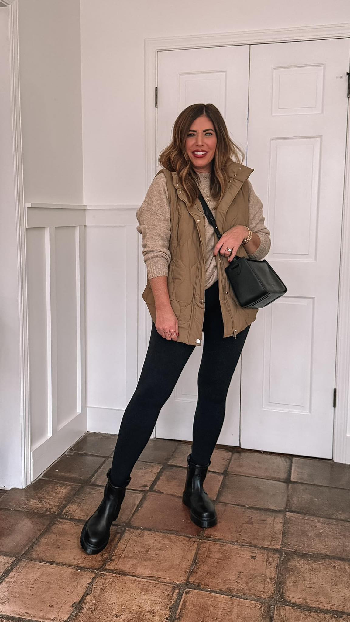 Comfy, casual winter outfit: Quilted puffer vest, fleece lined leggings, cozy sweater, and Doc Marten boots #WinterFavorites2025 

 #LTKHoliday #LTKSeasonal #LTKMidsize
