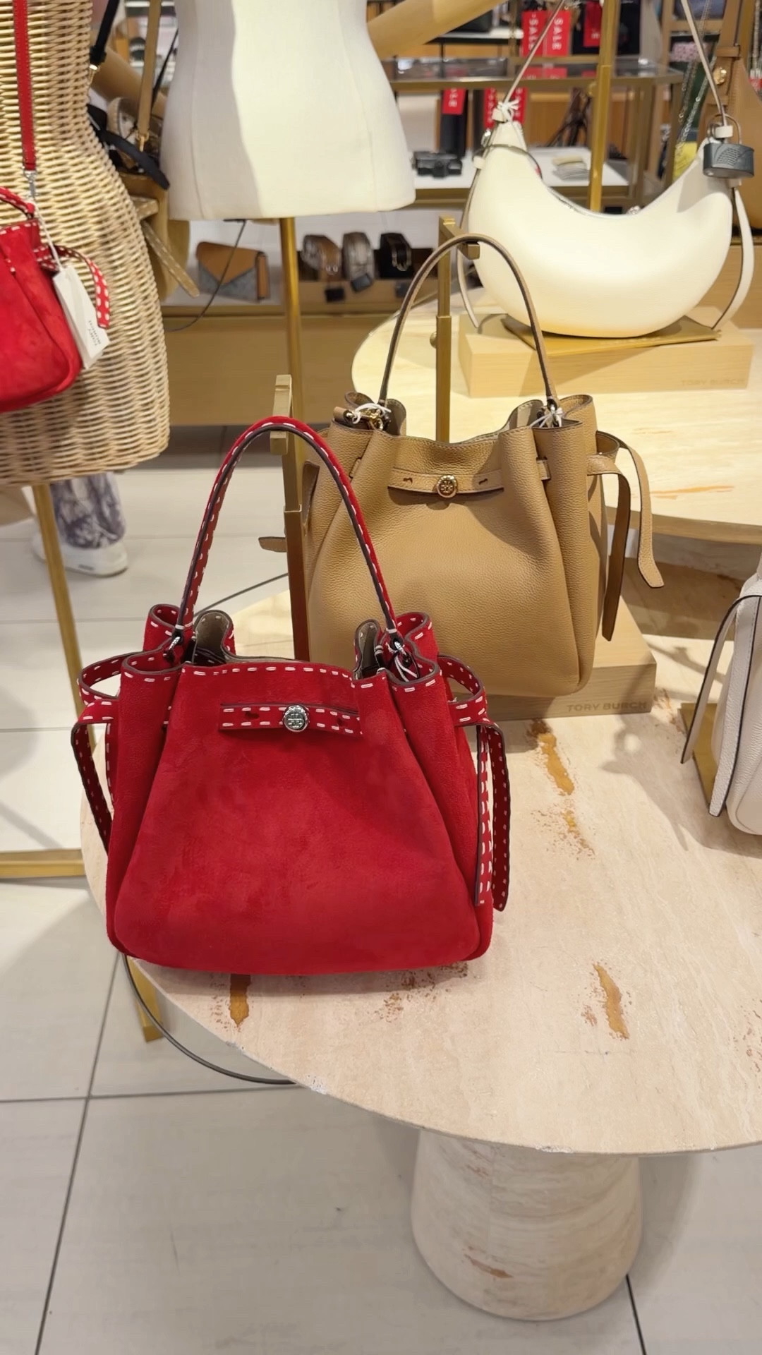 Love this Tory Burch bucket bag style that’s now available in this gorgeous red suede! Lots of other new Tory Burch bags for spring and summer available too including raffia, straw and crochet styles that are perfect for vacation outfits and resort wear. Always love the classic pebbled leather colors for everyday wear, workwear and travel outfits. 

#LTKOver40 #LTKWorkwear #LTKTravel