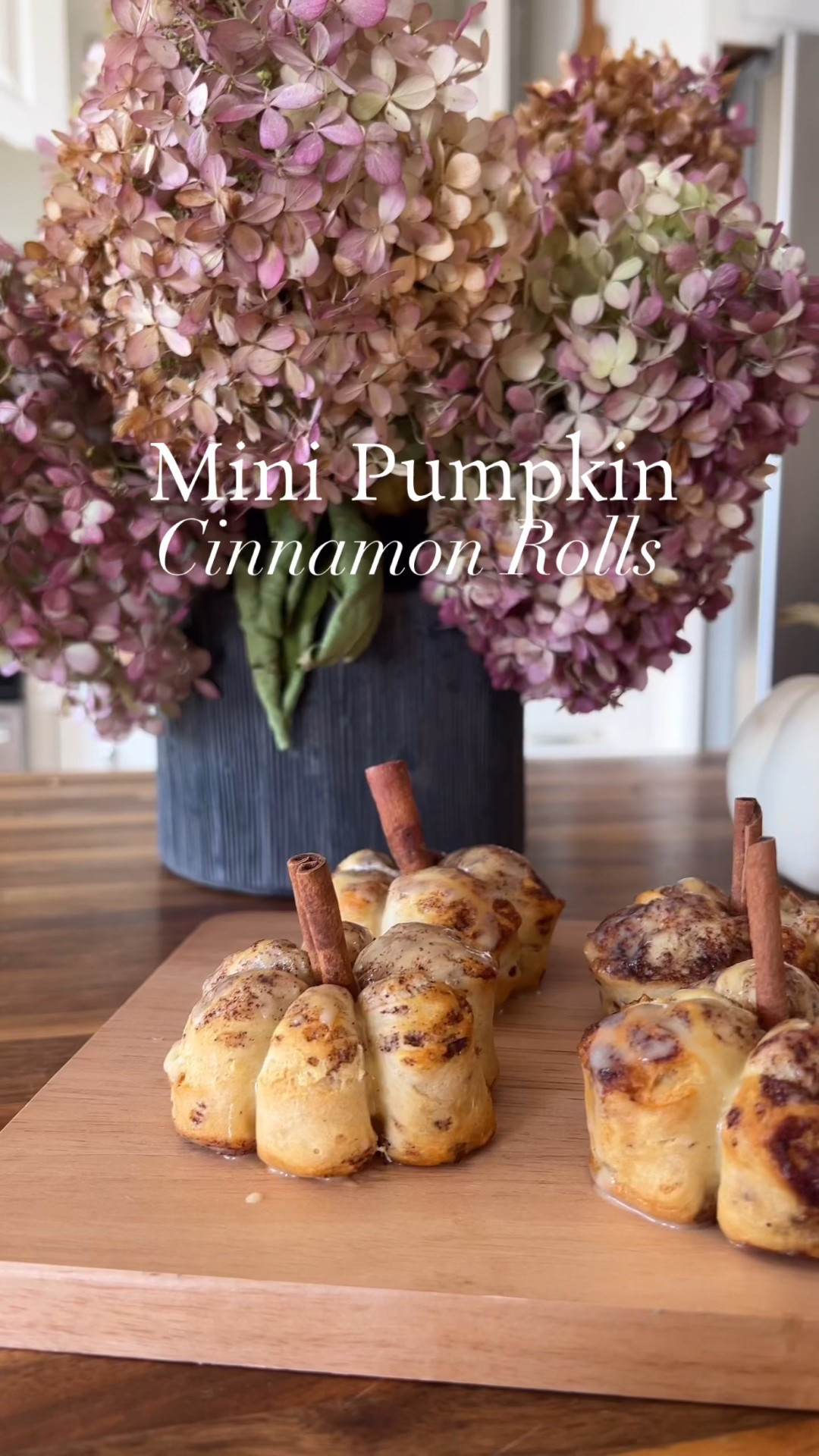 Hosting or just making fall mornings a little sweeter? These pumpkin cinnamon rolls are my go-to every October. Easy, fun for the kids, and so cute on a brunch board or Thanksgiving morning.

Here’s how to make them:
🎃 Use pre made cinnamon rolls (mini or grands)
🧵 Tie them with twine before baking to create pumpkin seams
🍊 Mix orange juice into the pre-made icing and drizzle
🌿 Add a cinnamon stick stem on top for the cutest finish
👧 Let the kids help with tying—makes it even more special

✨I’ve linked:
– The cinnamon rolls I used
– Twine + cinnamon sticks
– The serving platter 
