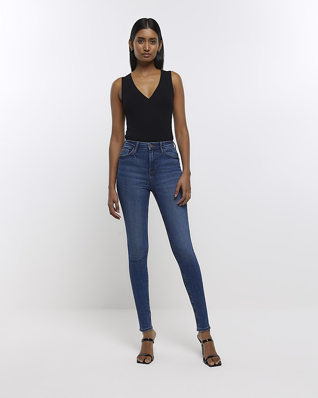 Blue high waisted bum sculpt skinny jeans | River Island (UK & IE)