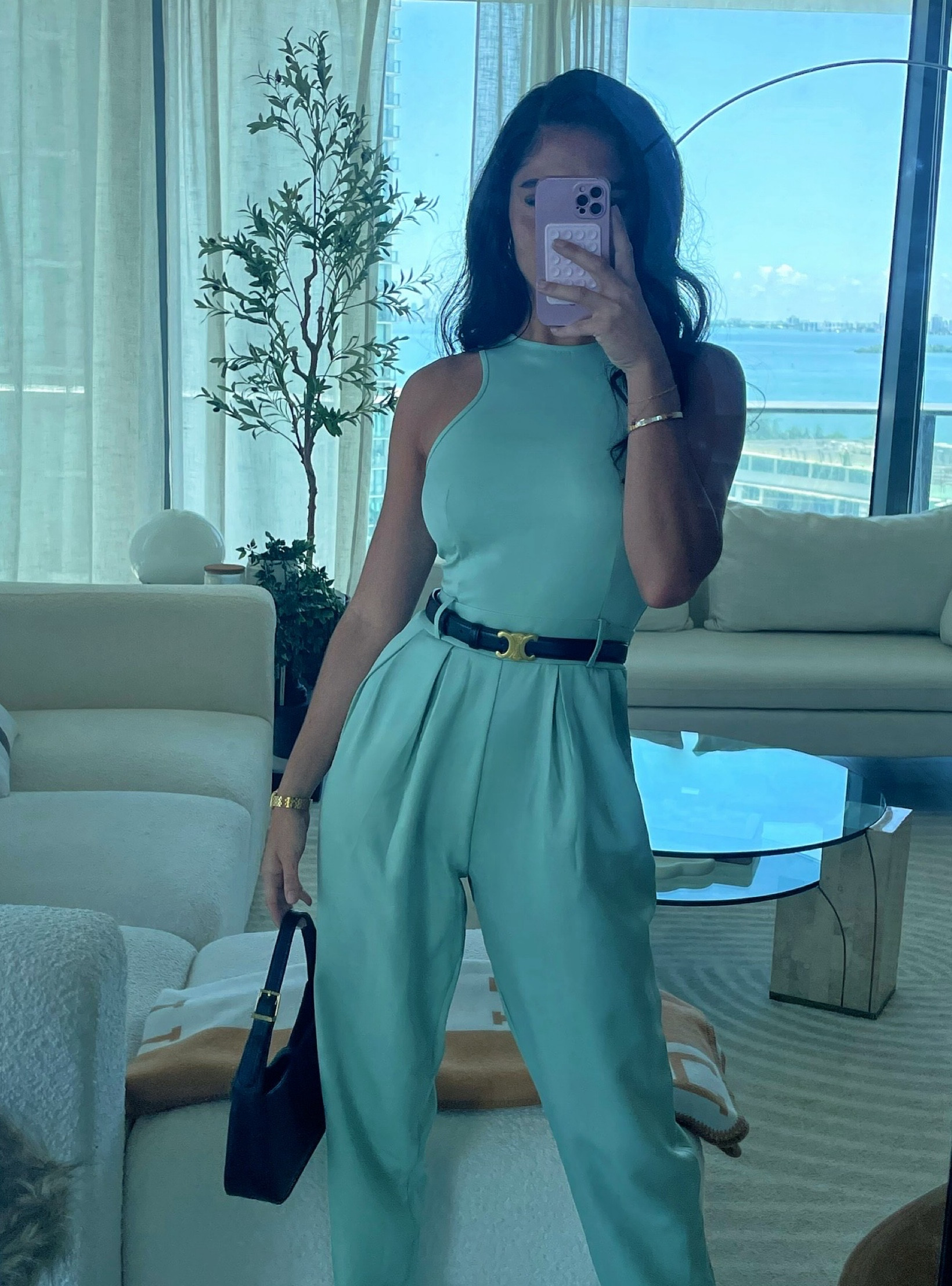 This sage green baggy jumpsuit is a weekend essential! With its racer back and pocket detailing, it’s perfect for any plans. Pair with strappy heels and simple accessories for a chic, on-point look. 

#LTKWorkwear #LTKFindsUnder50 #LTKStyleTip