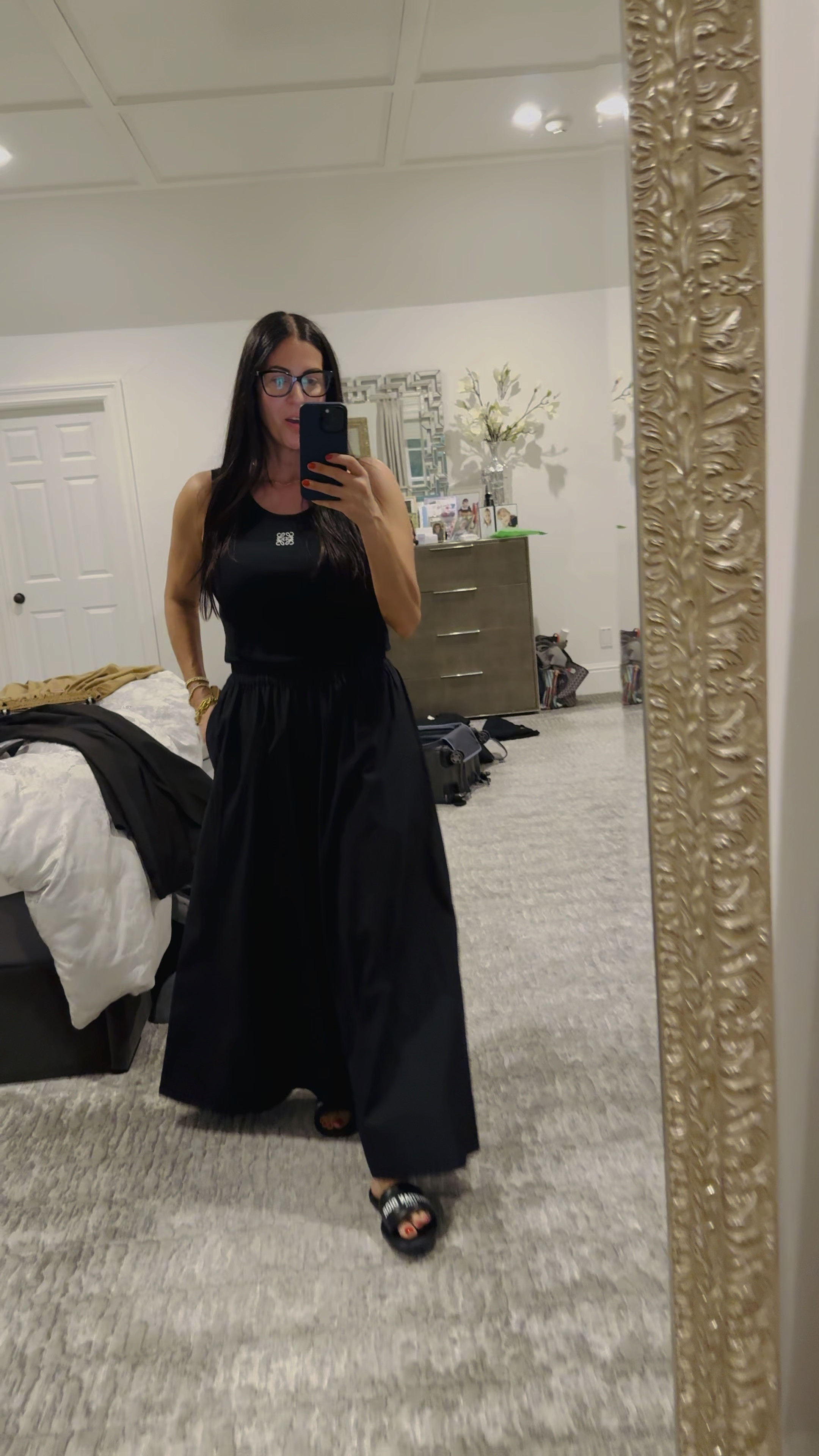 Super wide leg pants, slides or heels and tanks. Go to summer uniform 💛

#LTKTravel #LTKParties #LTKStyleTip