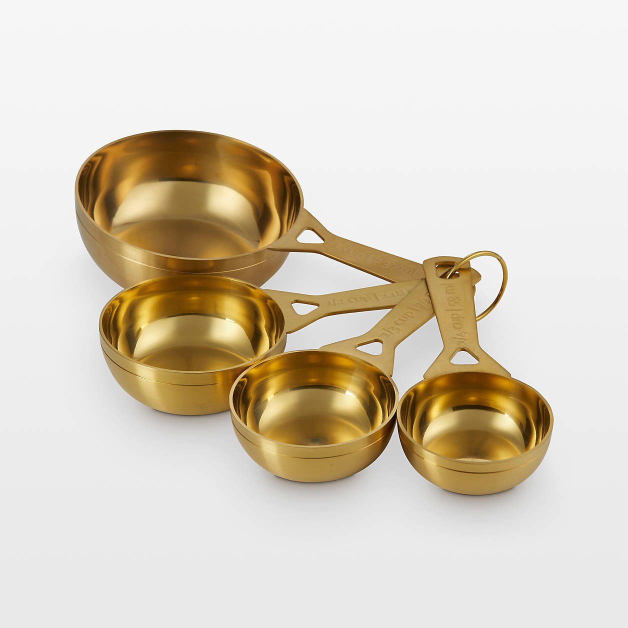 Le Creuset 4-Piece Gold Measuring Cup Set + Reviews | Crate & Barrel | Crate & Barrel