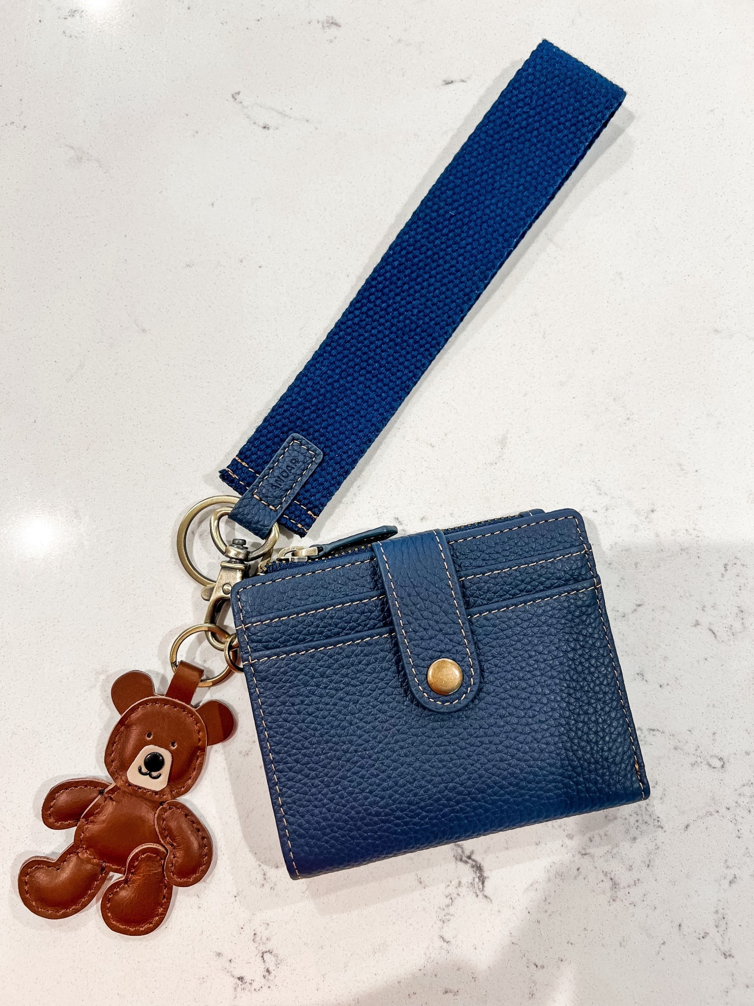 How cute is my new wallet and teddy keychain 😍🐻 It has 11 card slots and it’s so easy to grab and go for busy mamas with our hands full!

#LTKmomlife #LTKFindsUnder50 #LTKFindsUnder100
