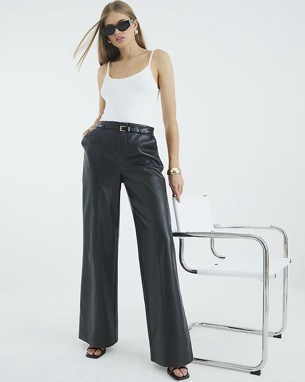 Black Faux Leather Belted Wide Leg Trousers | River Island UK & IE