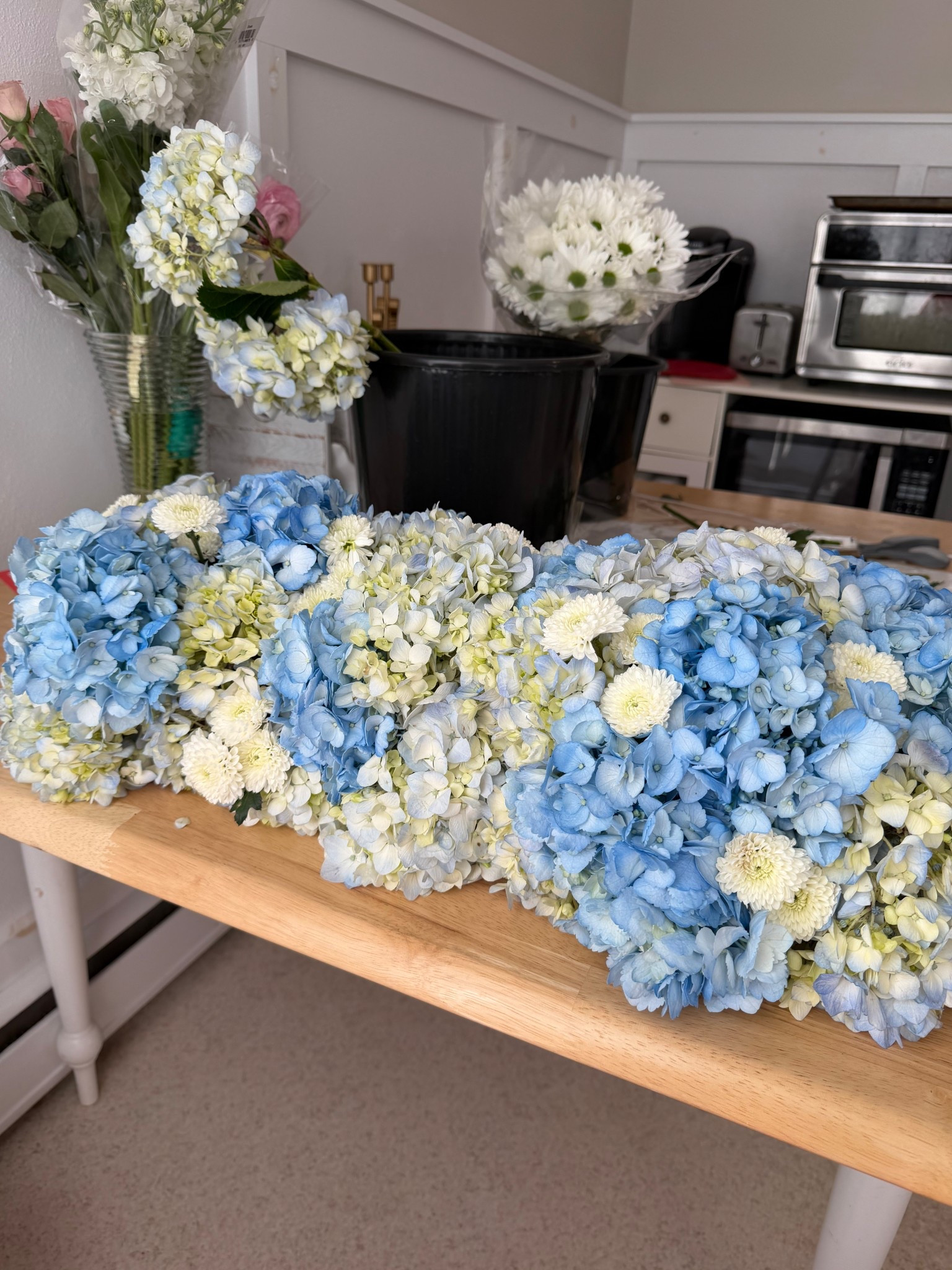 Everything you need to make this mixed blue hydrangea table runner for your Easter brunch or upcoming spring parties 🩵 

• 2 of the floral cages 
• 36 stems of mixed blue hydrangeas 
• floral shears 
• 10 stems white chrysanthemums 

#easterbrunch #diyflorals #easterdecor #springflorals #springflowers #easter #spring

#LTKWedding #LTKSeasonal #LTKHome