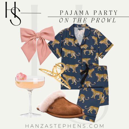 The cutest cheetah pj set I love to call “on the prowl”! This dark navy blue and cheetah full animal contrast is amazing (and looks so cute with this pink hair bow!)