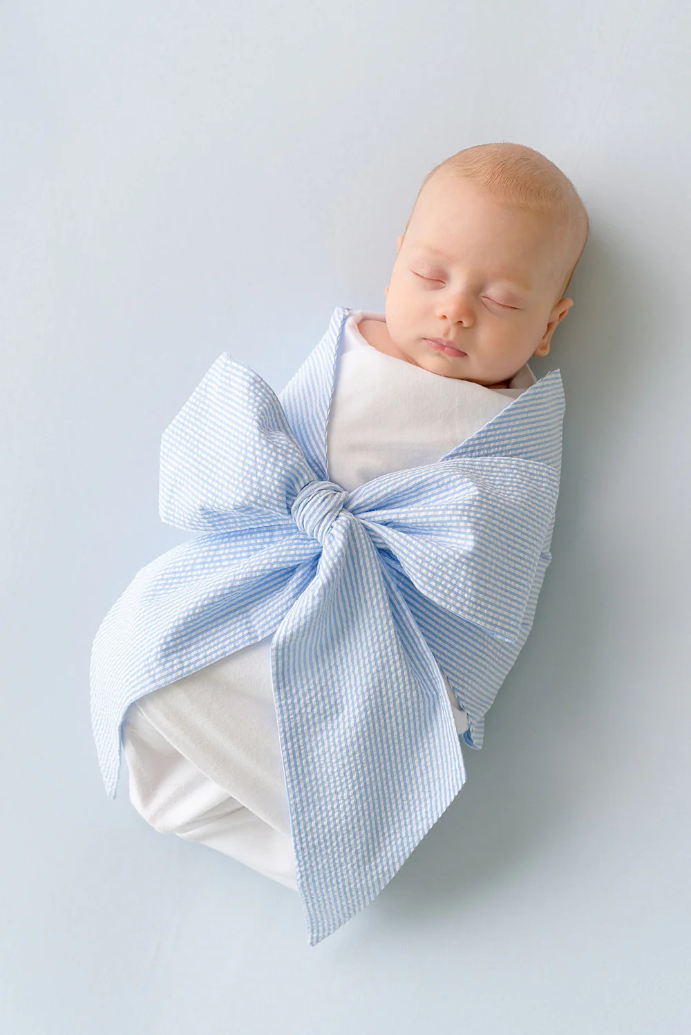 Bow Swaddle ® - Breakers Blue Seersucker | The Beaufort Bonnet Company