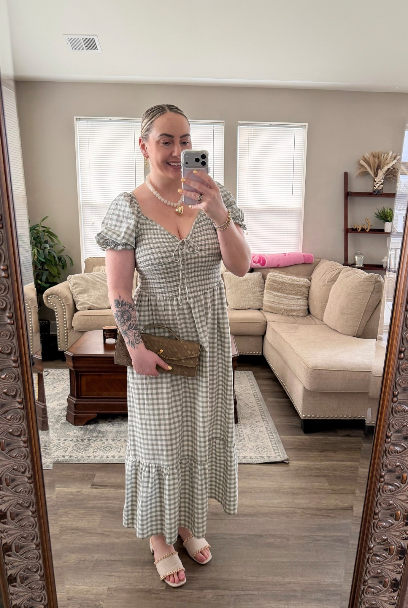 The sweetest gingham dress for spring 🌿

This green gingham midi dress is such a perfect spring and summer dress. I love the puff sleeves, tie front detail, and flowy fit, and it pairs perfectly with neutral sandals and a woven clutch.

Perfect for brunch, spring events, vacation dinners, or a weekend date night.

Fit: wearing size M sized down due to smocking 



#LTKSeasonal #LTKootd #LTKTall