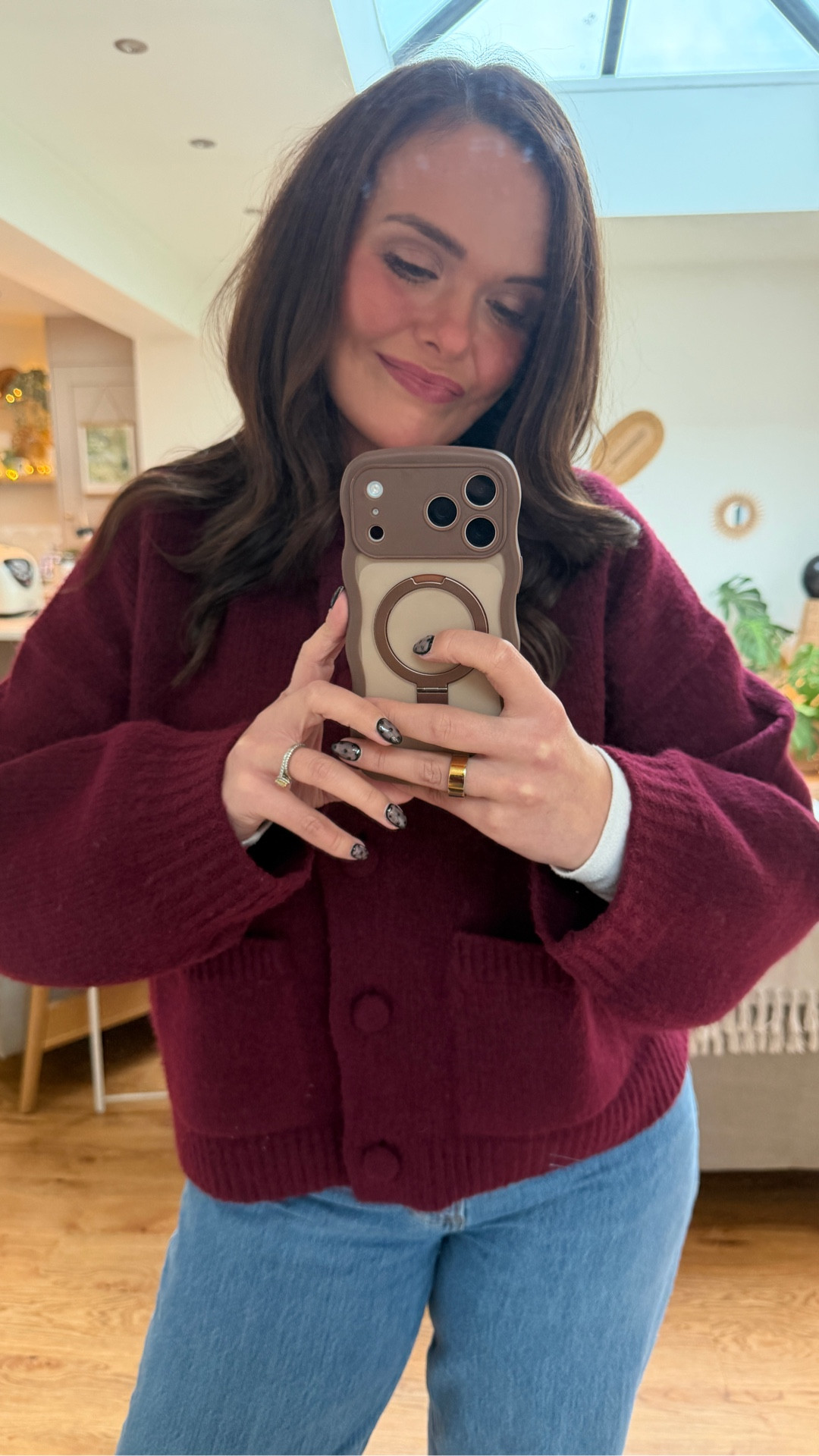 OUTFIT OF THE DAY: Mum of 3 

I feel like this outfit has a *touch* of Christmas about it and I’m very much here for that! I don’t really suit a traditional red, so burgundy is always my best bet if I don’t want to feel washed out. I’ve wanted a version of this cardigan for ages now, but I’ve always missed it every time I’ve gone to Primark. I’d love it in grey! But it’s very cosy and warm and the oversized buttons make it feel more styled somehow! 

Cardigan: Primark 
Long-sleeved top: ASOS 
Jeans: Abercrombie Curve Love - I got a 29 in these and I wish I’d gone for a 28 now, but they do fit my shape well and I’d recommend if you have a similar build to me. 
Shoes: Ugg Ultra Mini in Chestnut 

I’m a size 12 (sometimes 10)/M, 5”6, size 7 feet and I’m my colour season is a Soft Summer if that helps! 

#autumnoutfits #festiveoutfits #uksize12 #ootd #mumof3 #outfitoftheday 

#LTKcurves #LTKmidsize #LTKuk